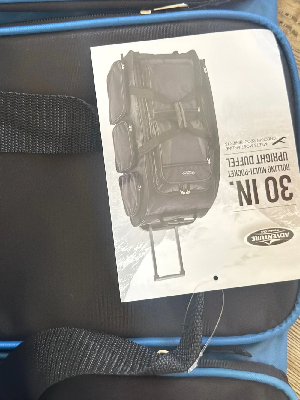 Travelers Club 30-inch Adventure Rolling Multi-Pocket Upright Luggage Duffel